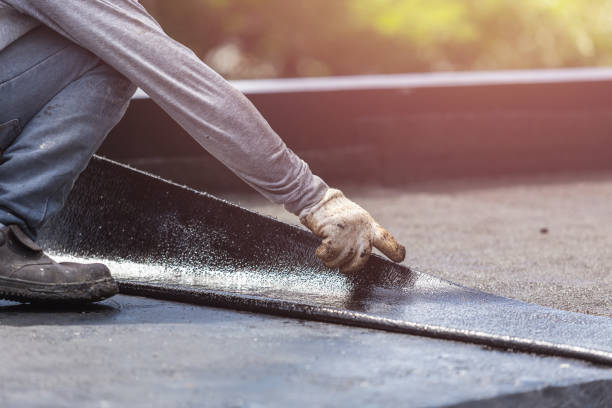 Professional Waterproofing technician working in Norvell, MI